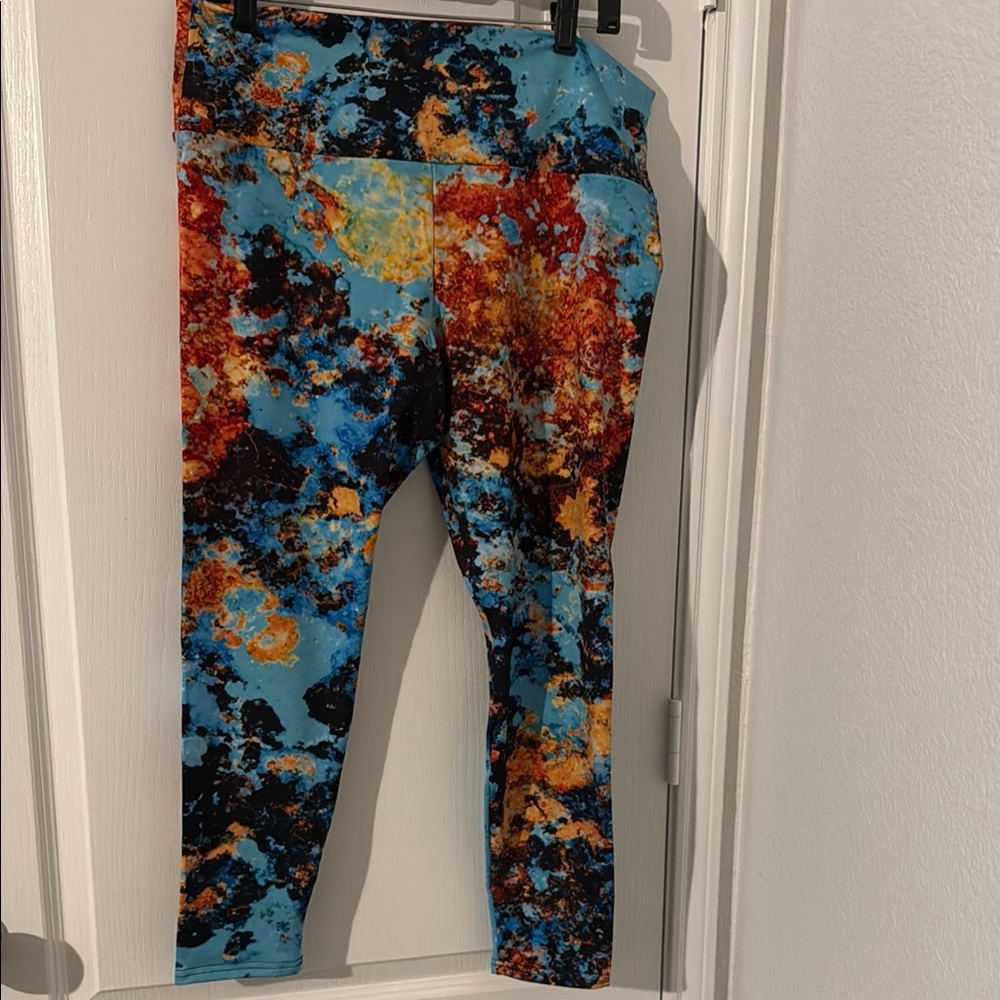 Blue and Orange Tie-Dye Leggings with Abstract Pattern